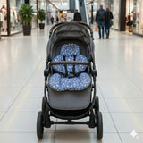 Coussin de poussette BébéYo - Étoiles blanc sur bleu turquin installé